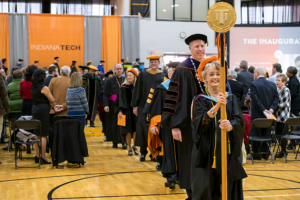 Sherrill Hamman leading the board of trustees and honored guests marching together during the inauguration of Karl W. Einolf