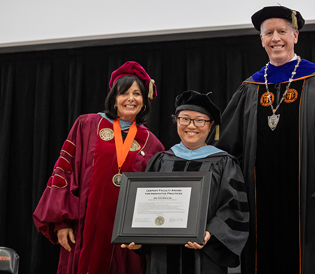 from left to right, VPAA Dr. Katherine Watland, Dr. Yun Su and President Karl Einolf